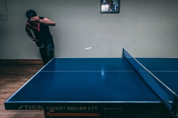 table tennis match intense rally